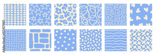 Organic set abstract minimalistic seamless patterns with different various shapes and wavy lines.  Modern geometric wavy texture . Blue and beige colors