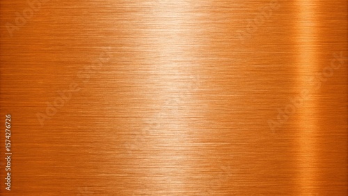 Closeup of a brushed orange metal surface with a warm, elegant texture