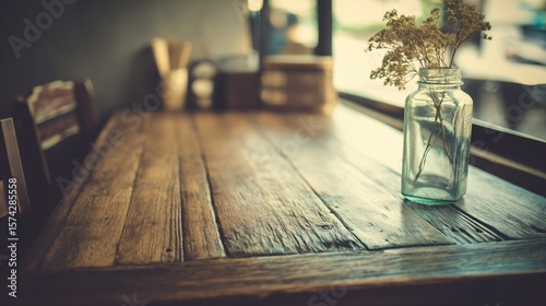 A rustic wooden table with soft light filtering through frosted glass, evoking nostalgia
