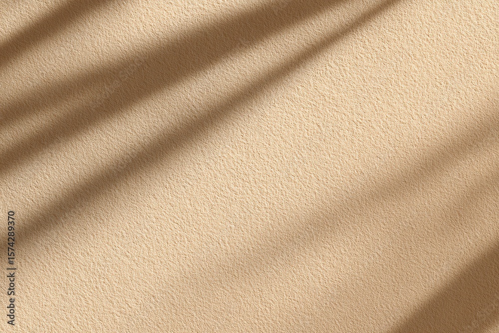 Fototapeta premium Textured beige wall background with shadow overlay for presentation