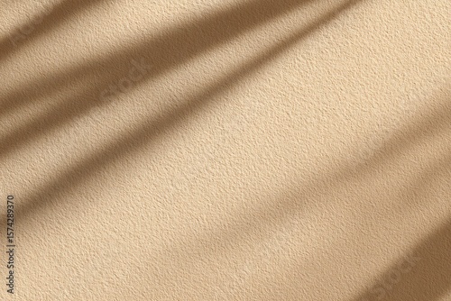 Textured beige wall background with shadow overlay for presentation