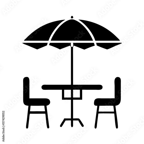 Outdoor seating area with table and two chairs under umbrella  