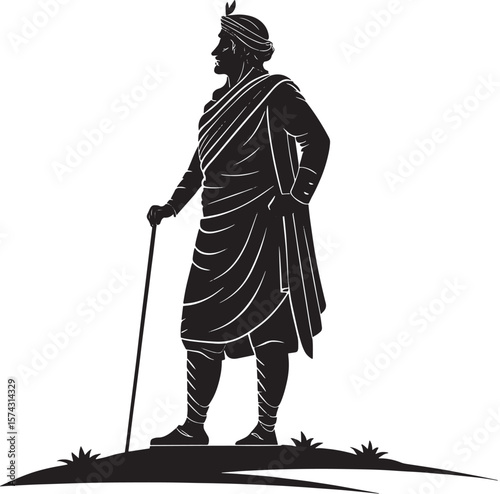 Man in traditional attire holding a staff traditional clothing