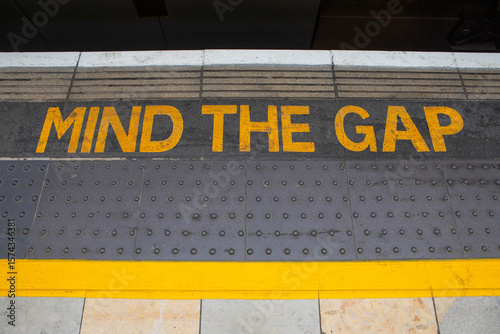 Mind The Gap Sign on a Railway Platform in London, UK
