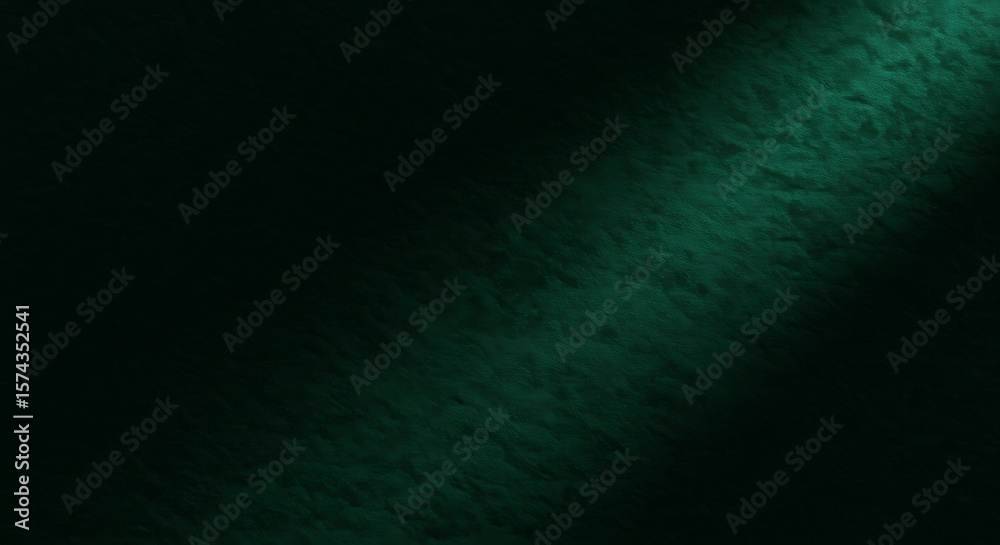 Obraz premium A dark, textured surface illuminated by a diagonal beam of green light, creating a dramatic contrast.