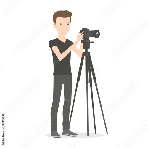 Young photographer capturing a moment with his camera on a tripod.