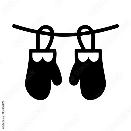 Black silhouette vector design of mittens hanging on a door