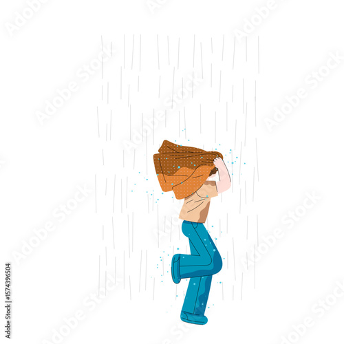 Boy with jacket above his head is running in the rain