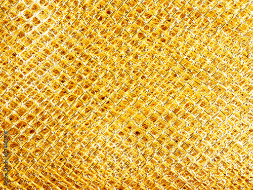 Golden glittering background using as festive luxury background