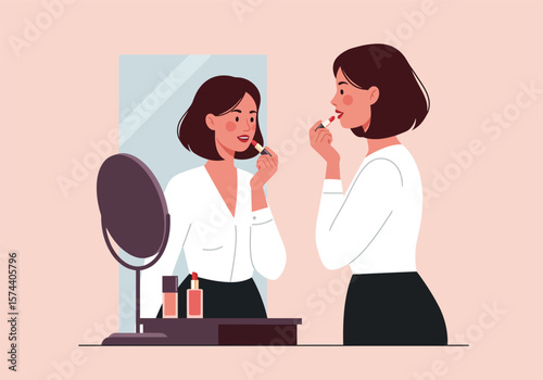 Woman with bob haircut applying red lipstick in front of a mirror.