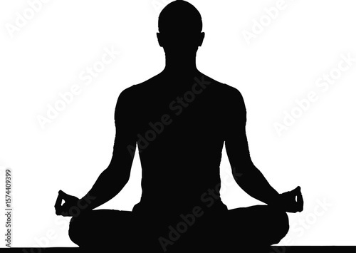 Silhouette of person meditating in lotus pose yoga