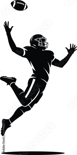 Football player leaping to catch ball american football