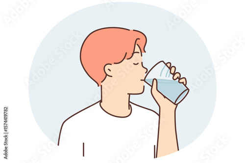 Thirst man drinks water from transparent glass, wanting to refresh himself after walking