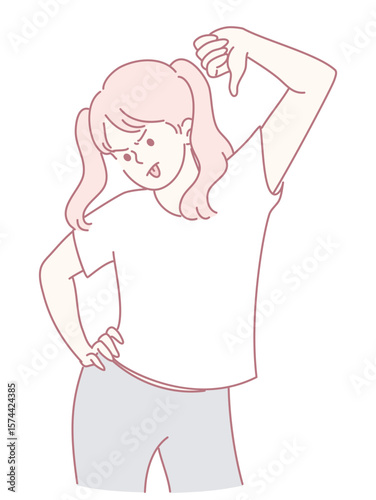 A young girl with cheerful pigtails expresses her strong disapproval by making a thumbs down gesture with her hand