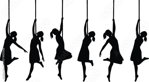 Black Silhouettes of Aerial Dancers Suspended from Ropes Against a White Background