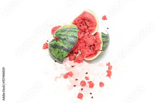 Close-up of a broken watermelon isolated on a white background.