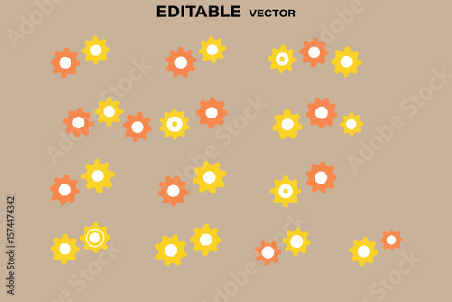 Collection of orange and yellow gears with white centers arranged on a plain beige background