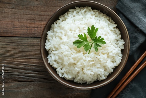 A simple yet elegant bowl of plain white rice kitchen table food photography natural lighting close-up minimalistic dining concept