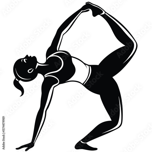 Graceful woman performing yoga king dancer pose silhouette