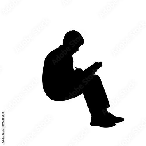 Silhouette of a Person Sitting and Reading a Book