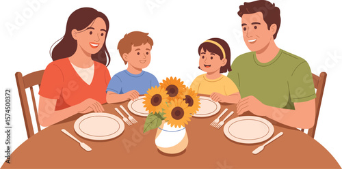 A family of four sitting at a table with sunflowers in the center of the table