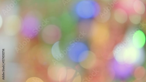 Multicolored Abstract blur lights Leaks 4k footage background, Bokeh effect with rays Christmas lamps garlands, for layout on your project, video styling, transitions