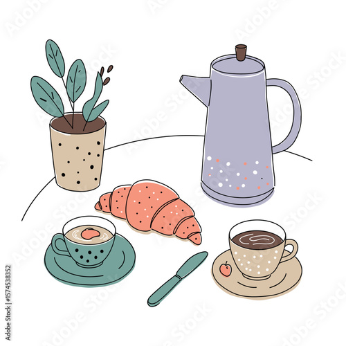 French breakfast setup with croissant, coffee, and a teapot on a table
