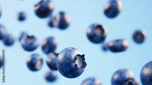 A vibrant cascade of plump, juicy blueberries float, the perfect fruit in a refreshing, natural blue.