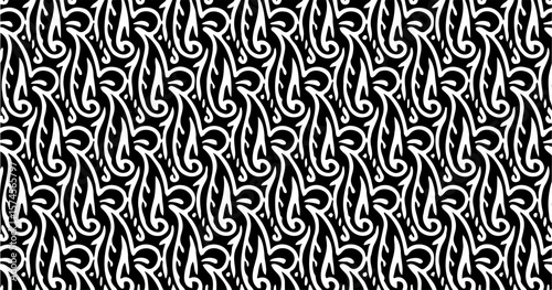 Intricate paisley-style design in black and white with a tangle of curves and teardrop shapes in a continuous flowing pattern.