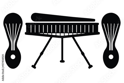 Fotografija Black silhouette of a vibraphone with mallets and two maracas