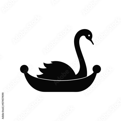 Silhouette of swan shaped paddle boat for romantic lake rides and leisure water tourism