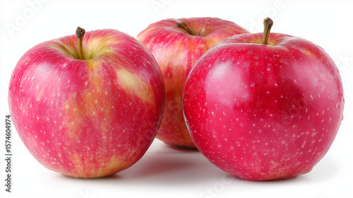 Fresh Pink Lady apples are isolated on a white background, highlighting their vibrant color and crisp texture.

