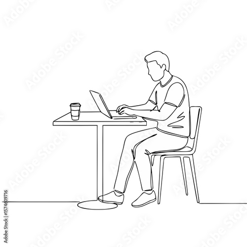 Man working at café table on laptop while sipping coffee  
