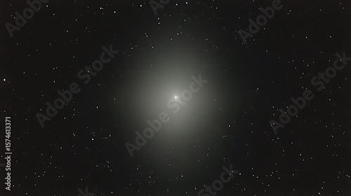 Faint celestial object amidst a star-studded expanse.