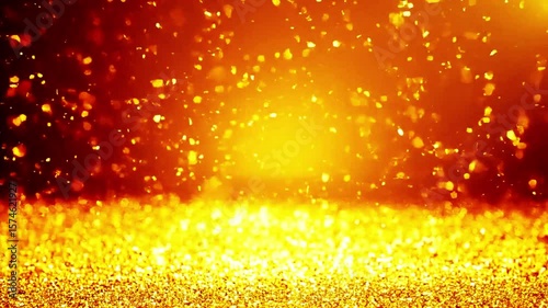 Abstract gold dust and glittering stars float above a luminous golden surface, creating a sparkling and dynamic background in deep space.