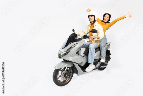 Canvastavla Happy Asian man and Asian woman riding motorcycle isolated over white background