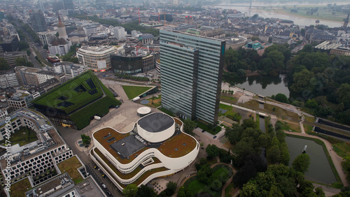 Fototapeta Naklejka Na Ścianę i Meble -  Aerial panorama view above the old town of the city Düsseldorf in Germany on a cloudy noon in spring	
