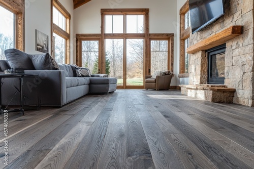 Gray wooden plank flooring in a modern living room.