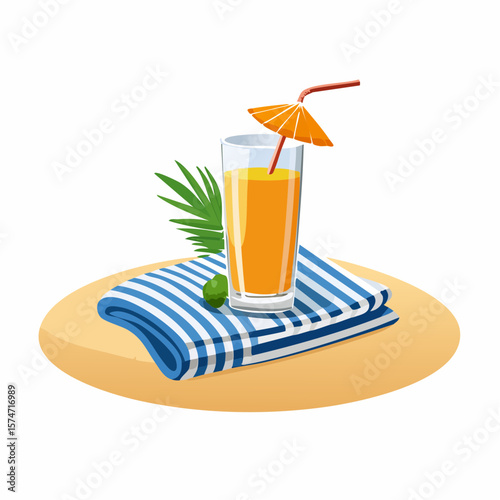 Beach towel and tropical drink on sand