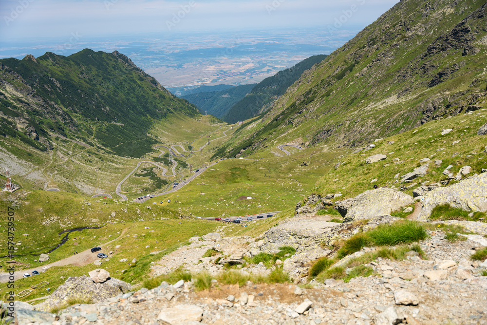 Fototapeta premium Transfagarasan Fagaras pass in summer. Crossing Carpathian mountains in Romania, Transfagarasan spectacular mountain roads in the world. Hiking and climbing route, famous place.