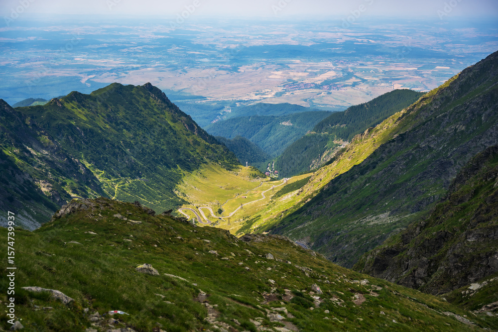 Fototapeta premium Transfagarasan Fagaras pass in summer. Crossing Carpathian mountains in Romania, Transfagarasan spectacular mountain roads in the world. Hiking and climbing route, famous place.