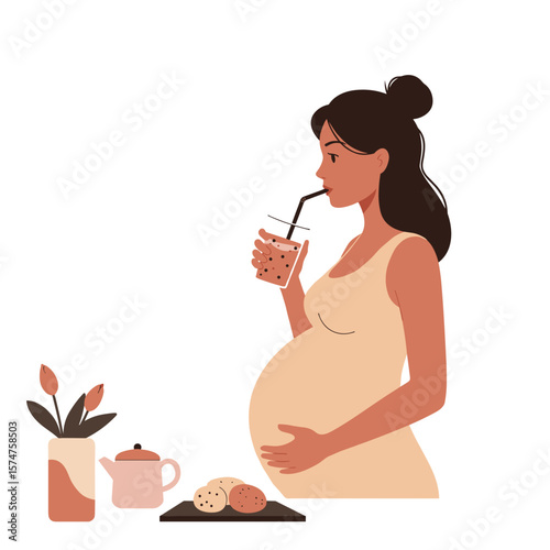 Pregnant woman enjoying a drink and cookies at home, embracing self-care and relaxation
