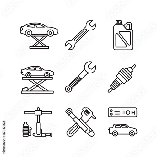An assortment of automotive repair tools and car maintenance equipment, featuring wrenches and spark plugs