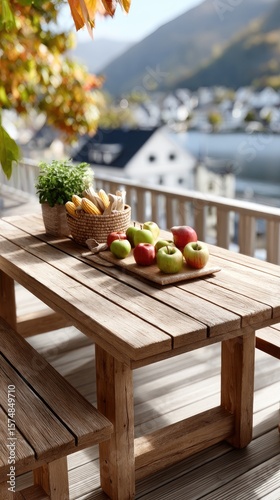 Wallpaper Mural Rustic wooden table adorned with pumpkins, apples, and corn against a breathtaking autumn mountain backdrop creates a seasonal atmosphere Torontodigital.ca