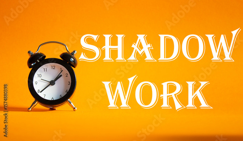 Shadow Work symbol. Concept words Shadow Work on Beautiful orange background with alarm clock. Business and Shadow Work concept. Copy space.