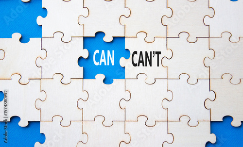 Can or Cant symbol. Concept word Can or Cant on wooden puzzle. Beautiful blue background. Business and Can or Cant concept. Copy space