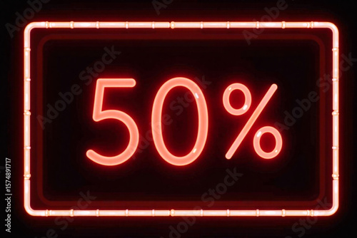 Neon sign displaying 50% discount in red on black background  