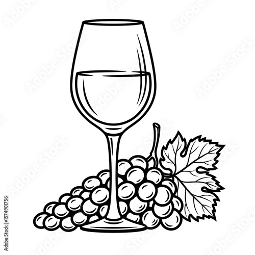 Glass of wine next to bunch of grapes in black and white