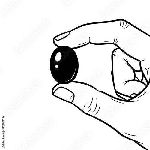 Hand holding a single grape in black and white