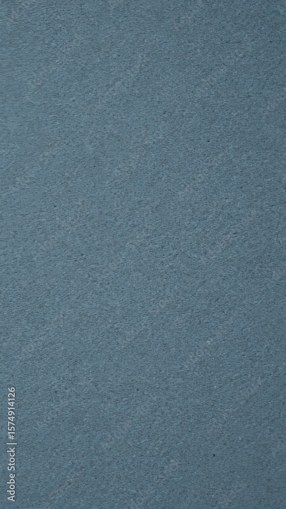 Fototapeta premium Closeup of a weathered blue wall, textured background. Wallpaper Dark navy blue dark abstract textured. Dark matte background